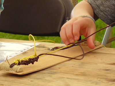 In progress Half-Hitch Sennit in brown and yellow cotton cord, at Cornbury 2013