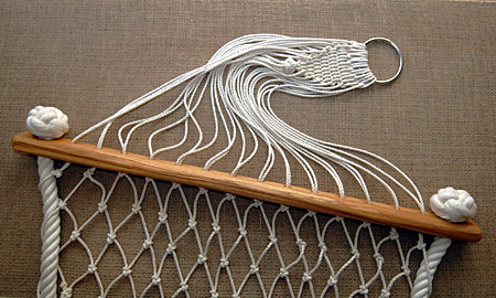 Hammock with ash wood stays, hand netted in 4mm cotton seine twine and side ropes in 24mm cotton with manrope end knots