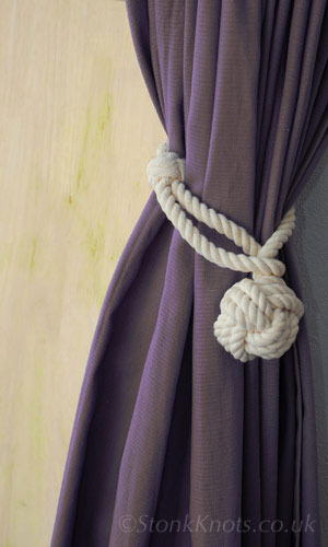 Monkey fist and eye splice loop rope curtain tie back on curtain