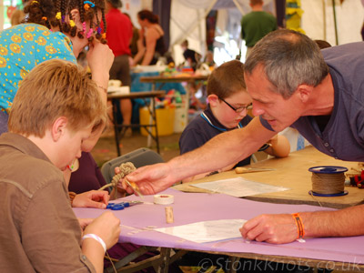 Demonstrating the use of a fid at a knotting workshop, Wychwood 2012