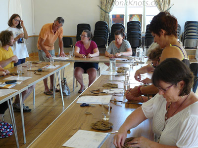 Opening a knotting workshop at Frome Festival 2013; learning the Turks head weave