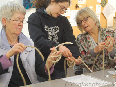 Teaching the Monkey's Fist knot in hemp cord at a day knotting workshop, The Workshop for the Would-Be Creative, 2015