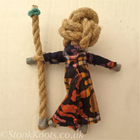 Clothed rope doll and hemp staff with coloured cotton cord decoration, Elric;