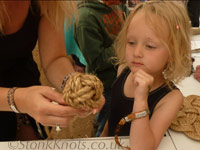 Learning to tie the Monkey's Fist knot, Isle of Wight 2012